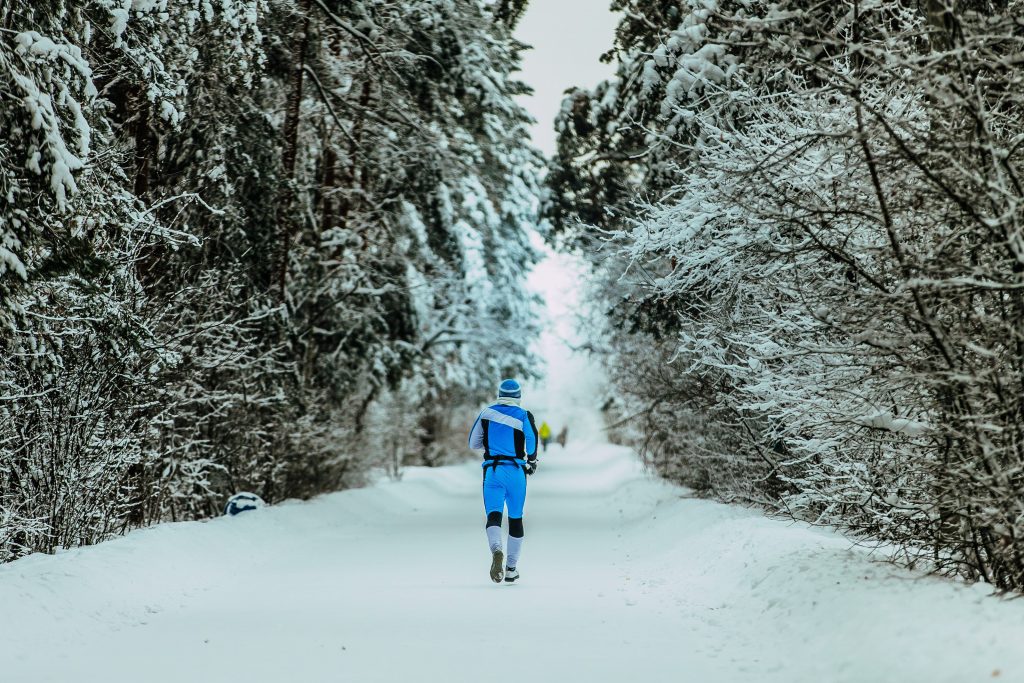 man running in winter forest 2021 08 26 15 33 09 utc min